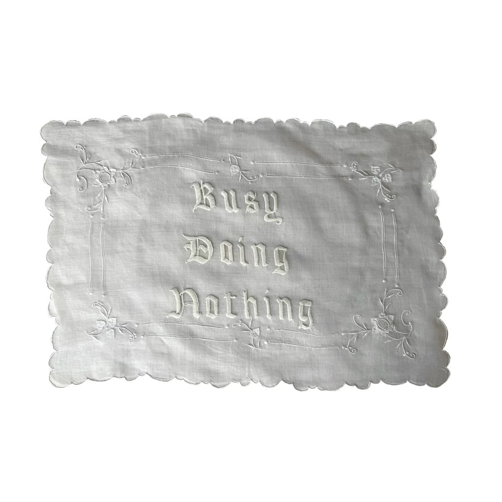 Busy Doing Nothing vintage embroidered artwork on white background