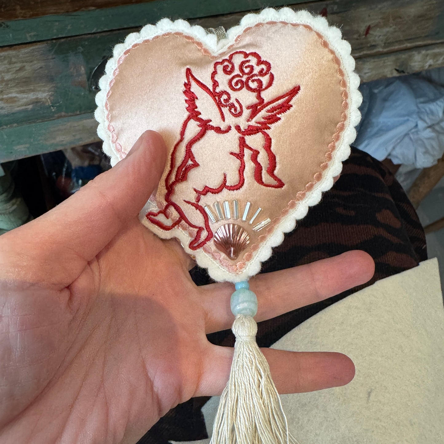 Cherub heart decoration in hand