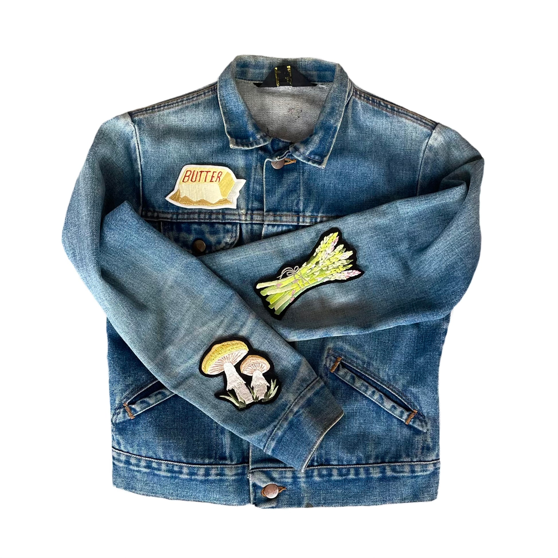 Patches on denim jacket