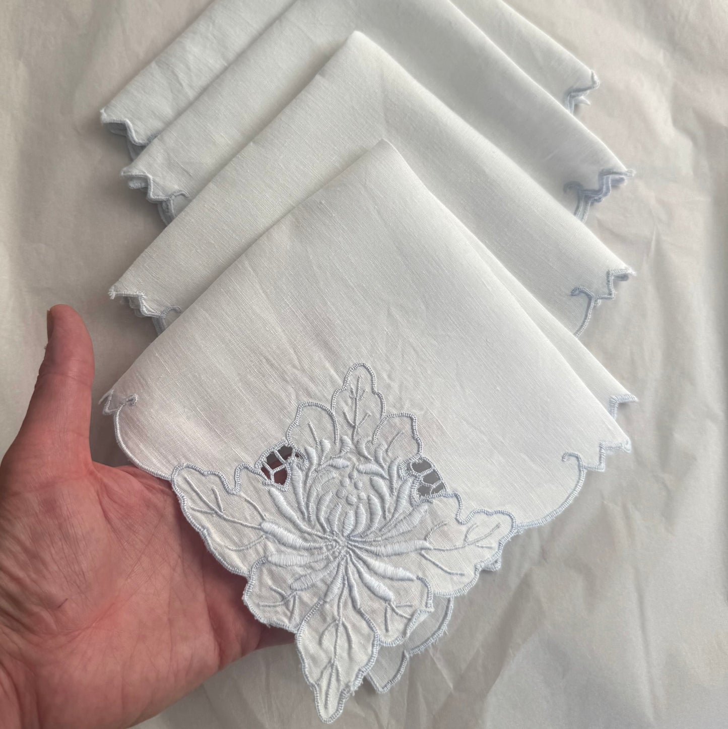 Set of white handkerchiefs with pale blue floral embroidery