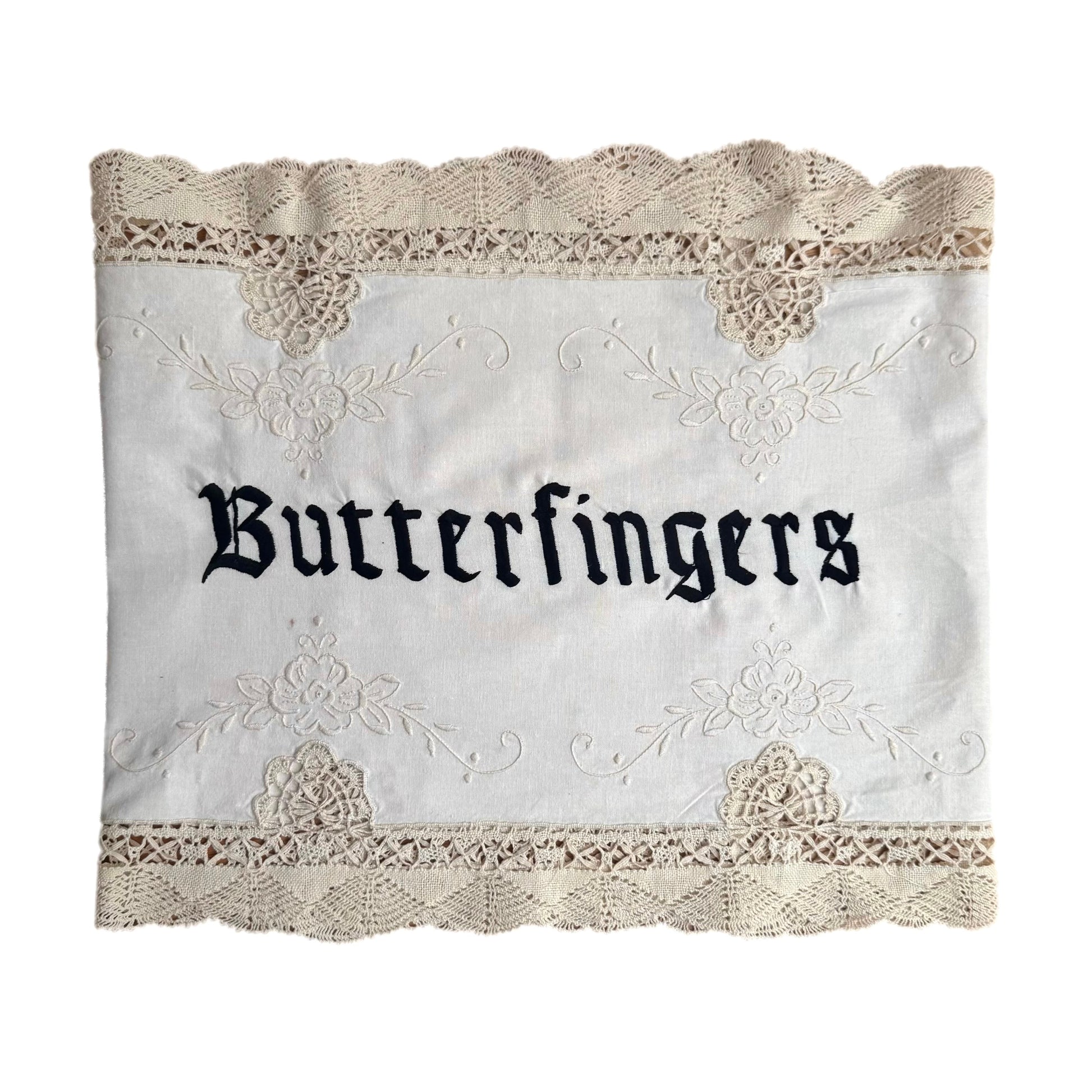 Butterfingers embroidered artwork on white background