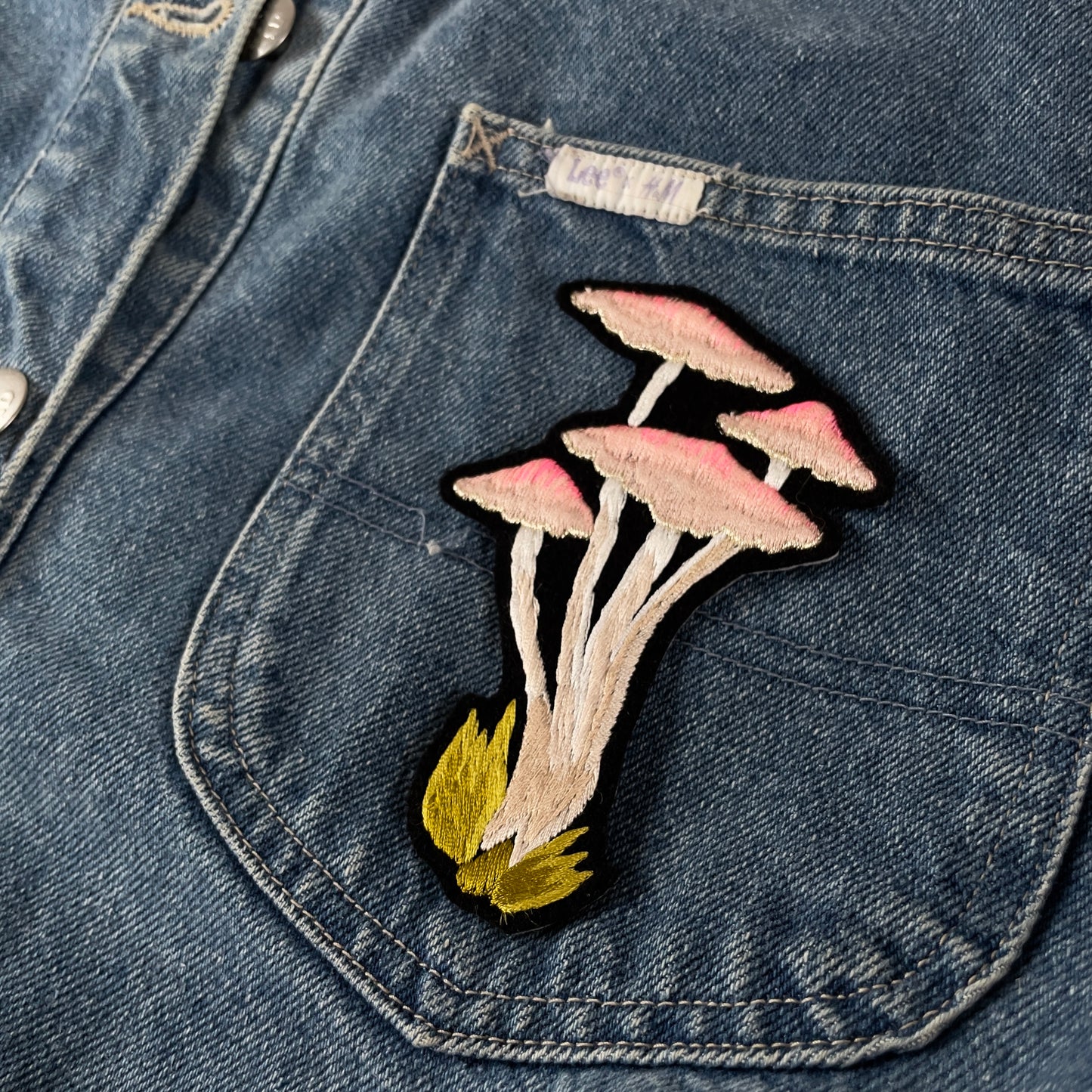 Woodland Mushroom Embroidered Patch show on pocket of denim shirt