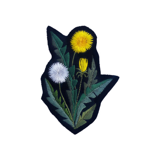 Dandelion embroidered patch on white background