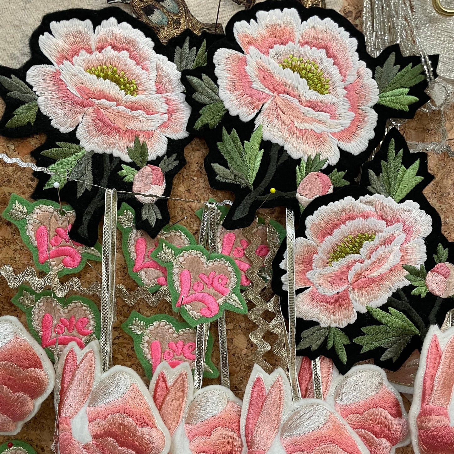 peony patches on cork board