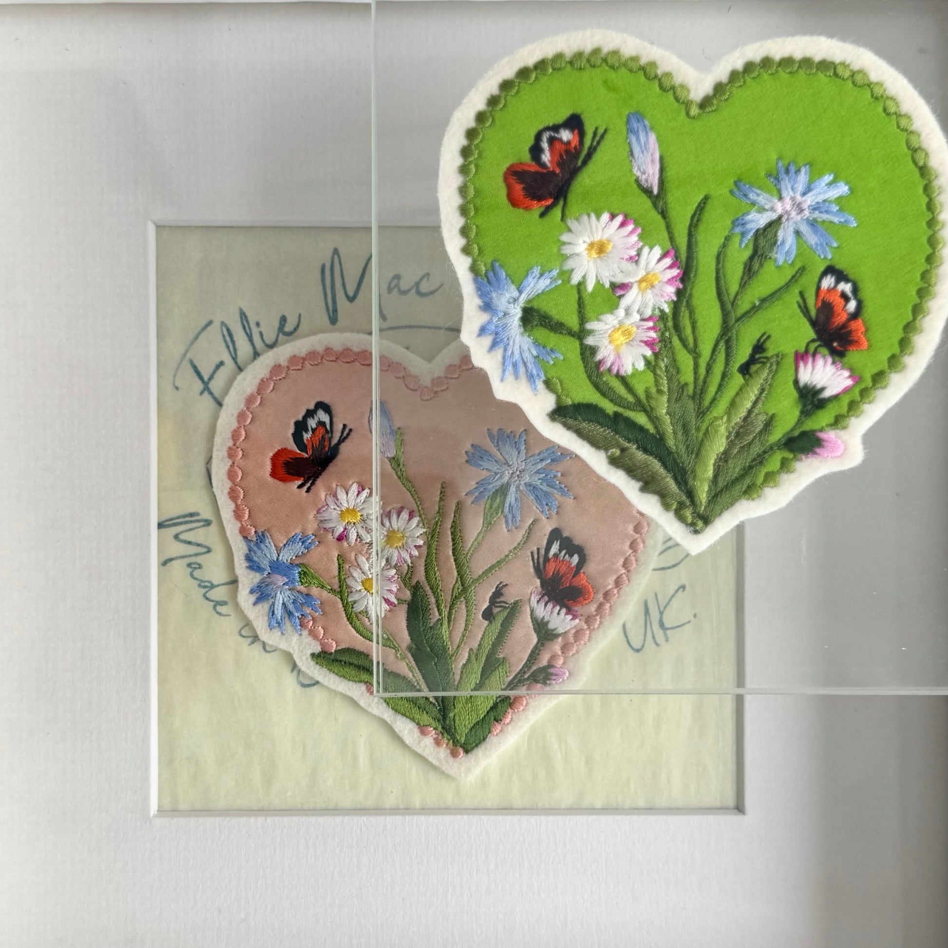 Heart-shaped embroidered patches with butterflies and flowers on a card with 'Ellie Mac' branding.
