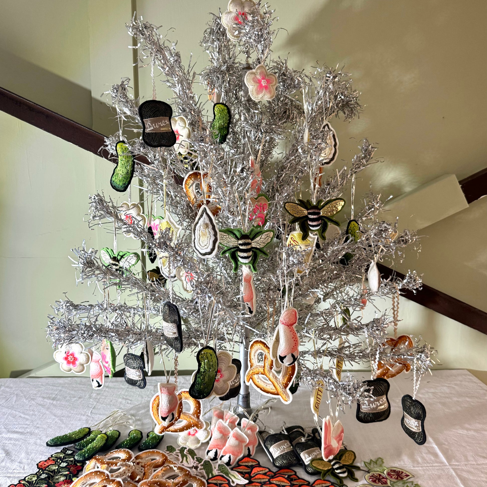 Decorations hanging on silver tree