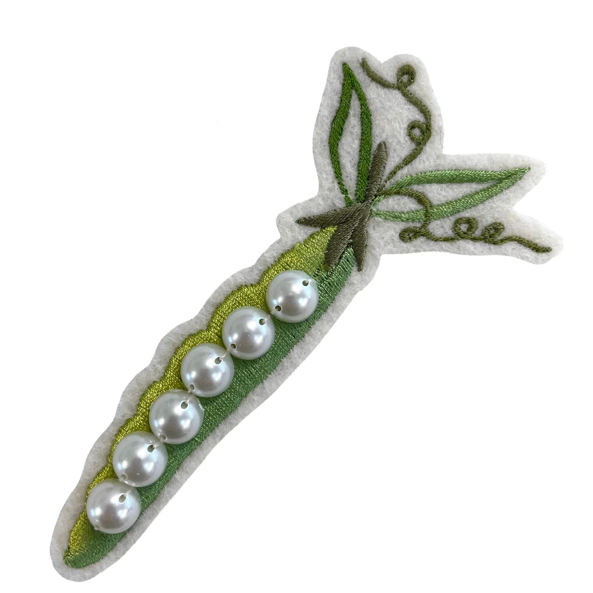 Green embroidered pea patch with flat back pearls sewn on, on white background