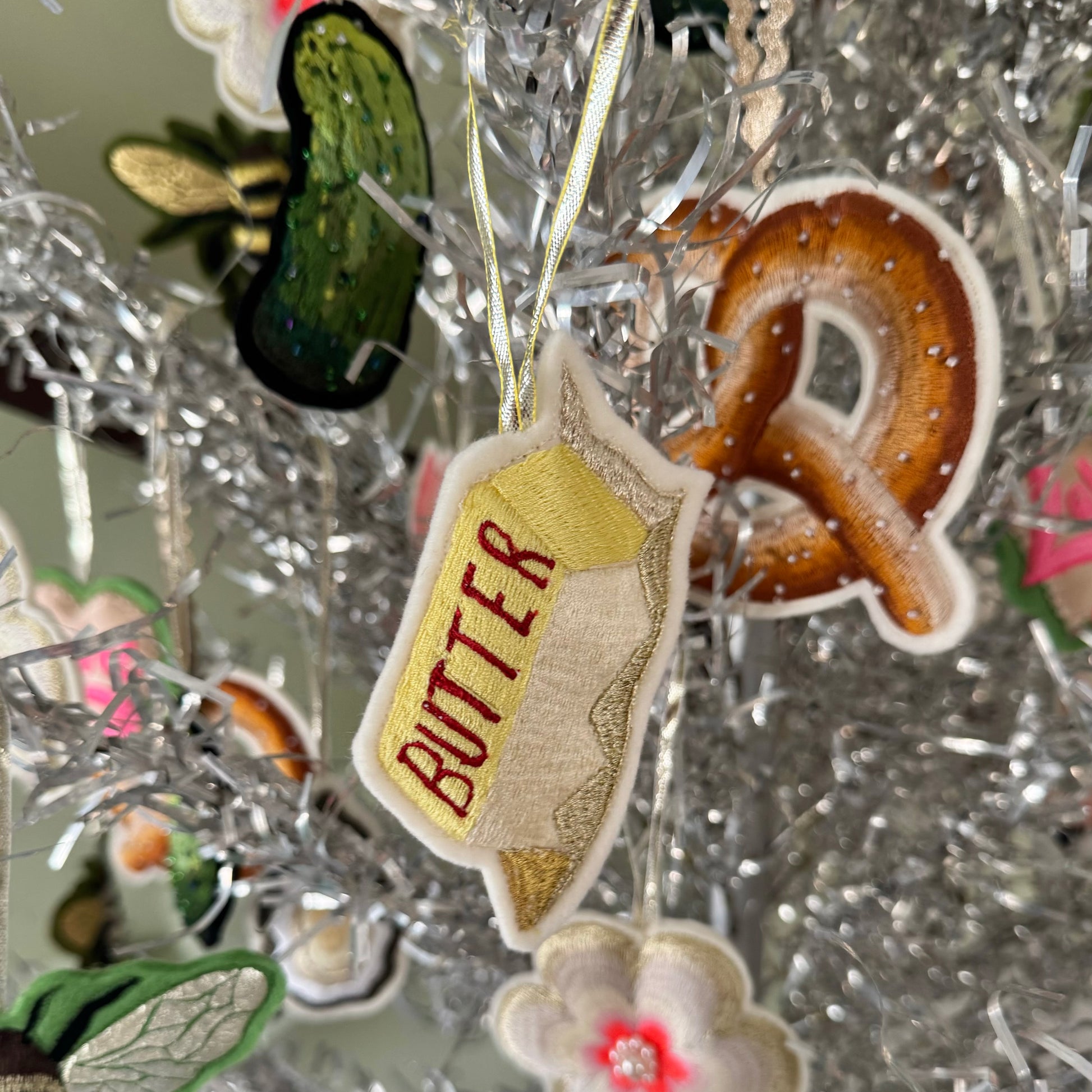 Butter decoration on a silver Christmas tree