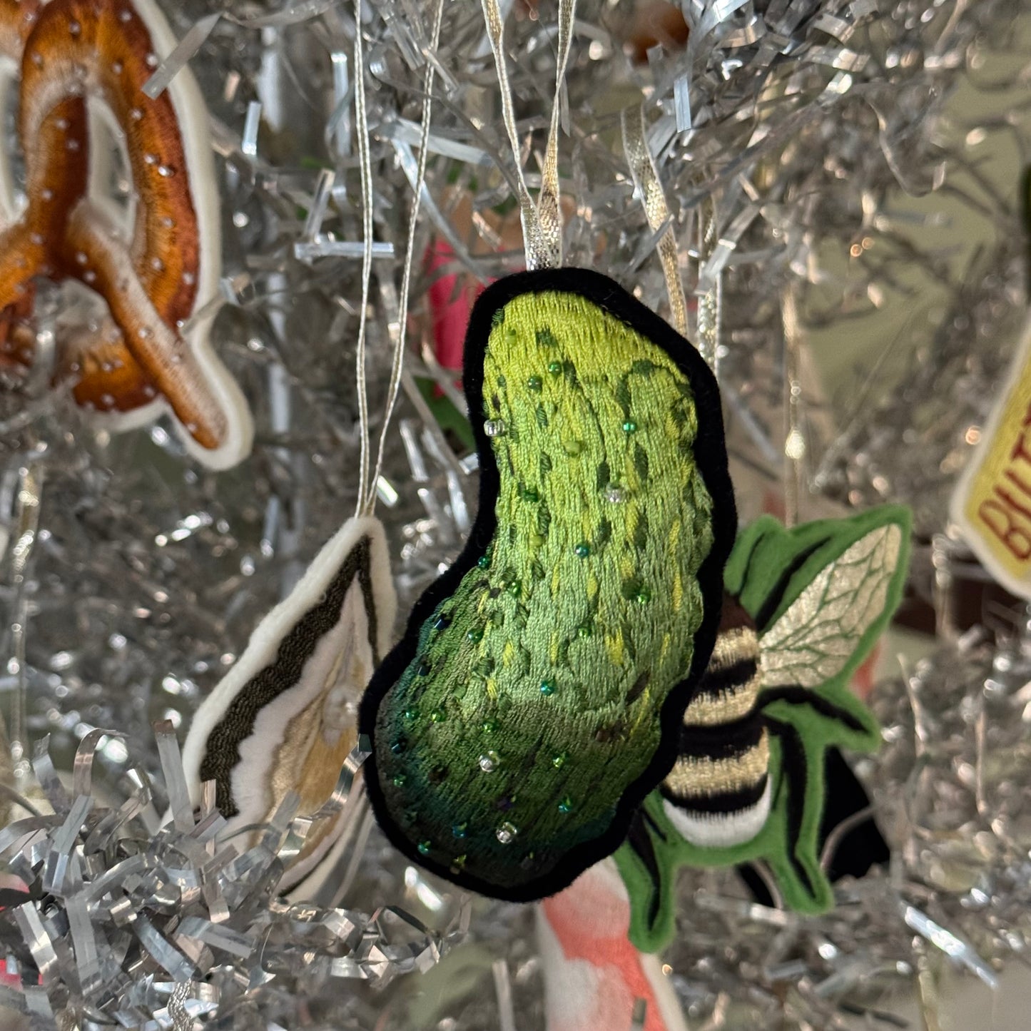 Pickle decoration hanging in tree