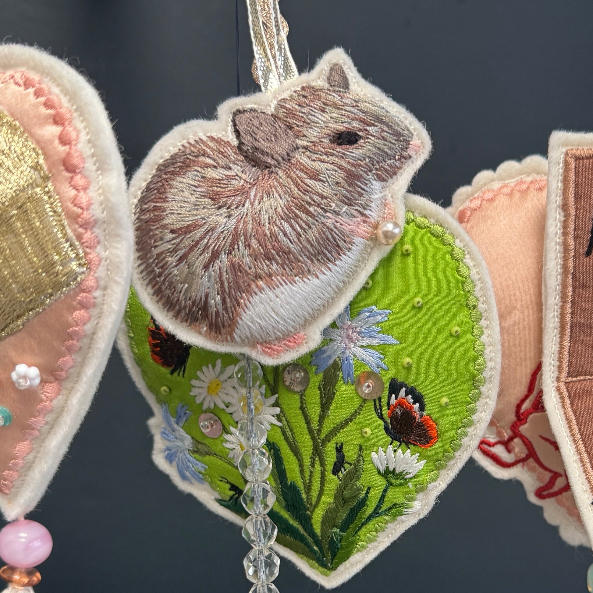 Mouse patch hanging with other decorations