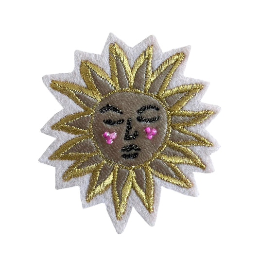 Tiny sun patch on a white background