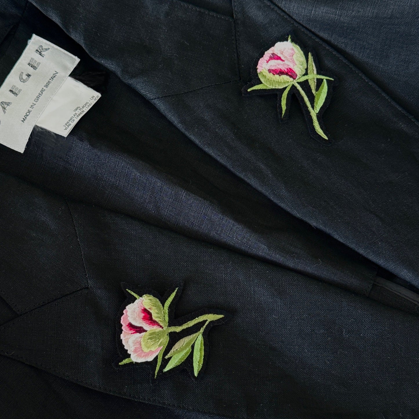 jacket, featuring two embroidered pink peony buds with green leaves on the lapels