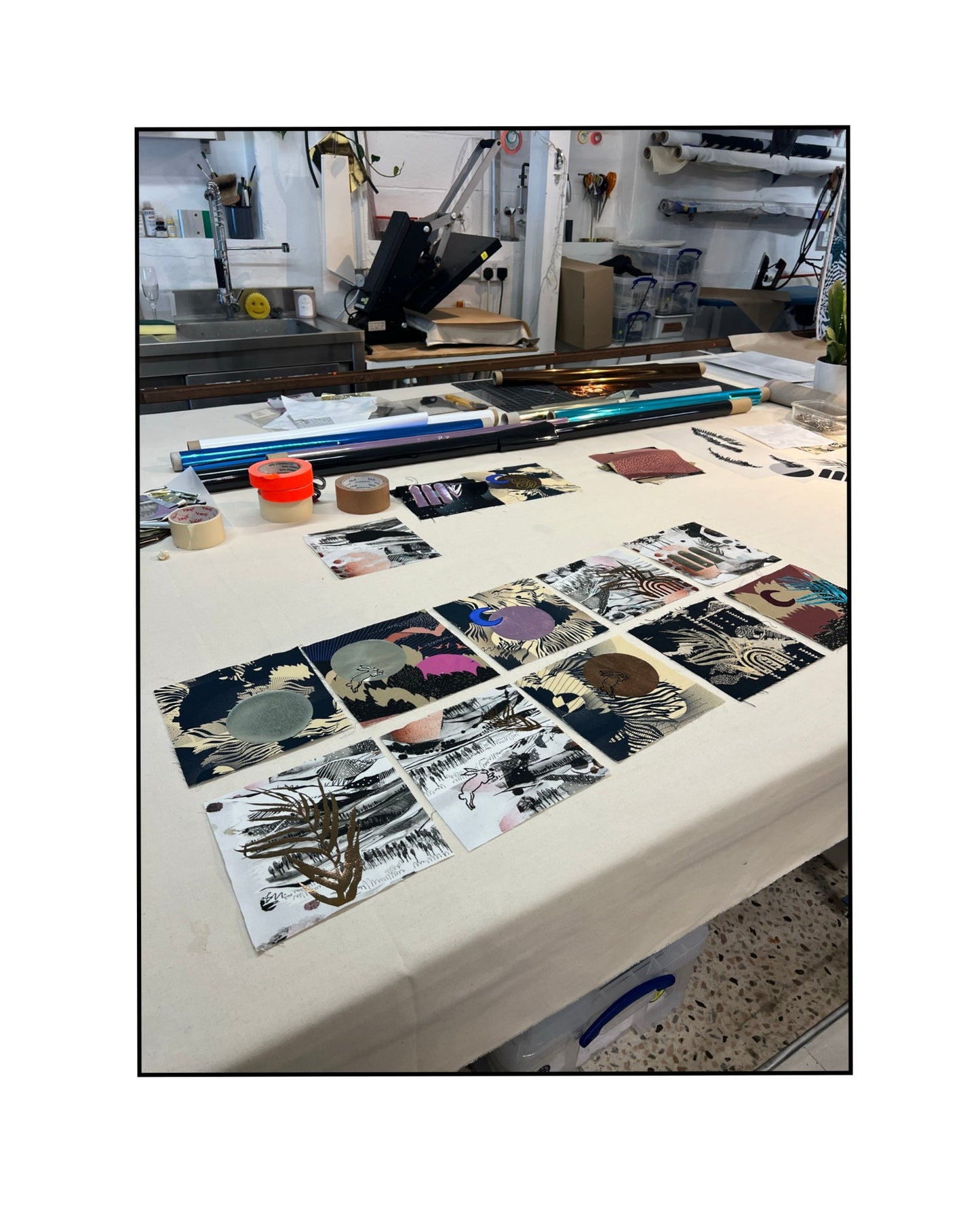 Table with printed designs in a workshop setting