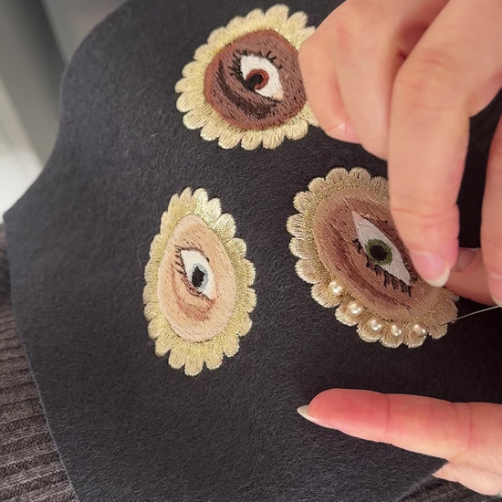 lovers eye patch being hand beaded