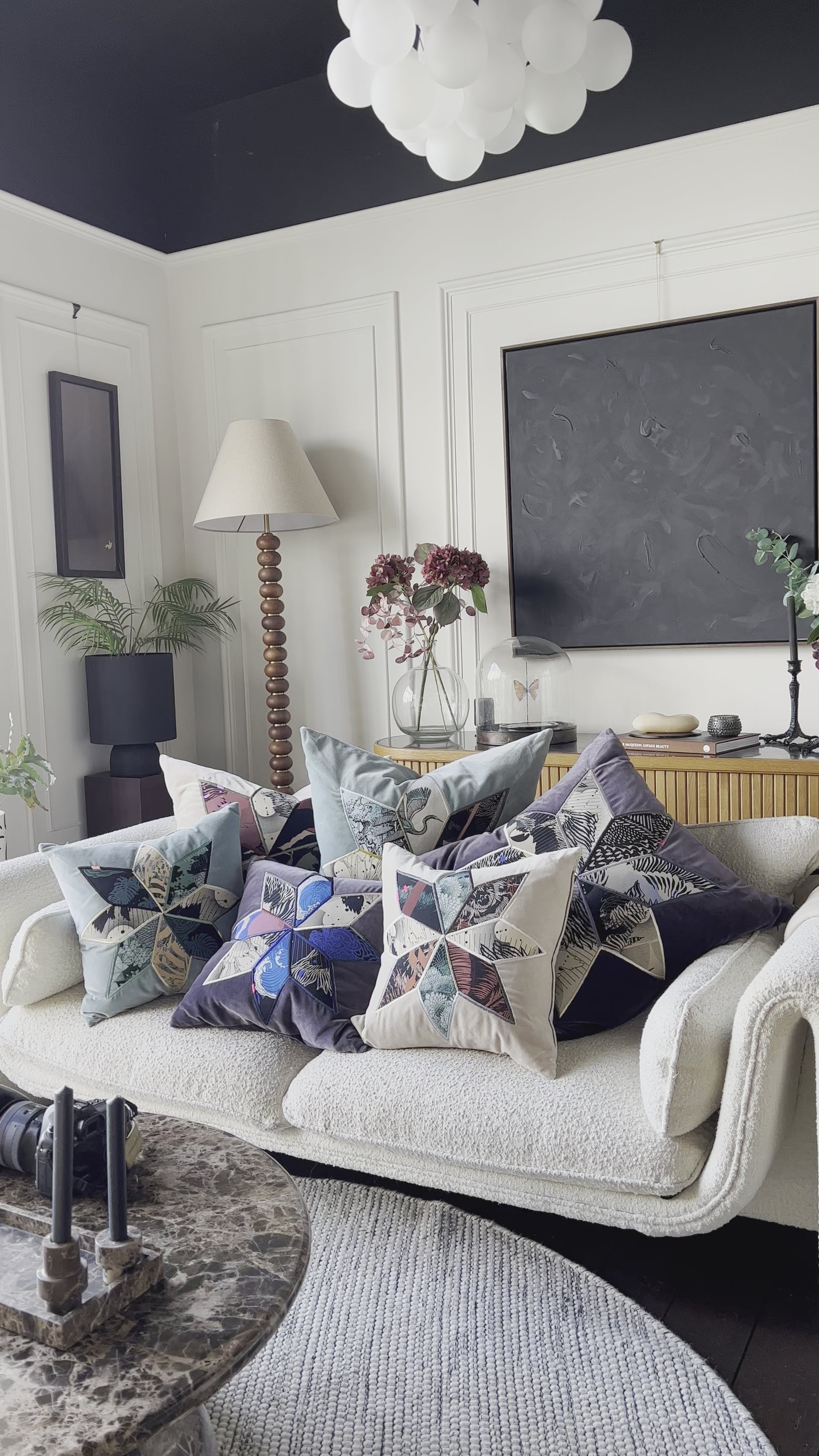 A video showing some of the cushions from the Sophie Darling & Ellie Mac collection on a sofa
