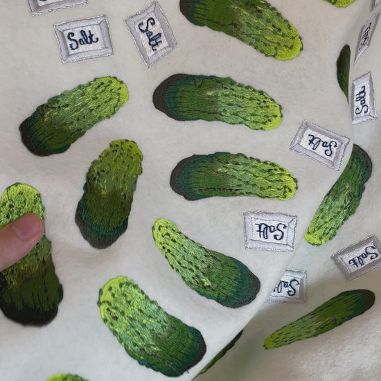 A film showing the pre-cut gherkin and salt embroidered patches