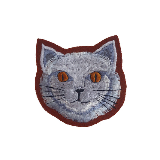 Fat cat embroidered patch on white background