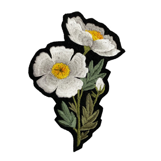 Fried egg flower embroidered patch on white background