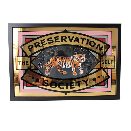 Embroidered prowling tiger and gold leaf artwork shown in black frame on white background