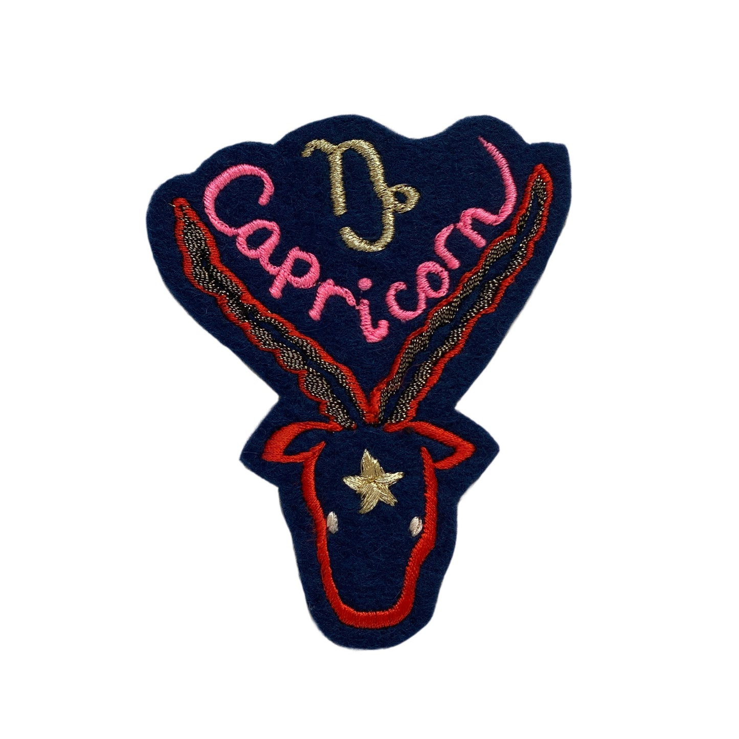 Capricorn embroidered patch on white background