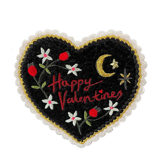Black valentines heart embroidered patch on white background