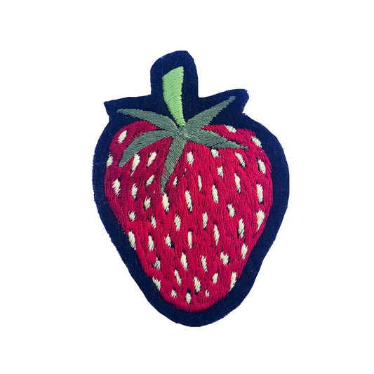 Strawberry embroidered patch on white background