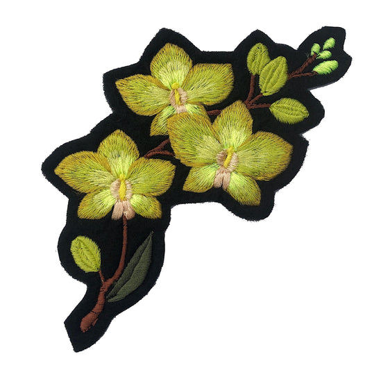 Orchid embroidered patch on white background