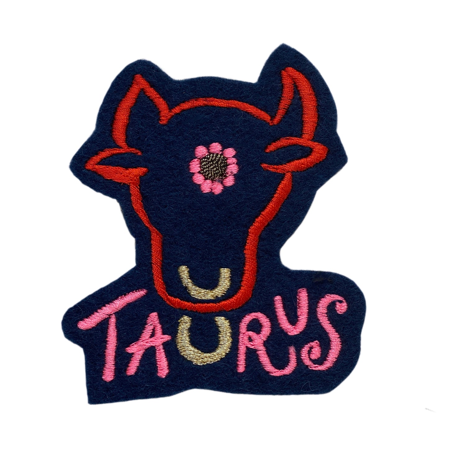 Taurus embroidered patch on white background